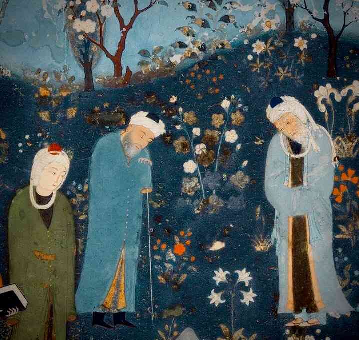 Three dervishes in robes stand in a beautiful hillside garden, all looking downward, absorbed in contemplation.